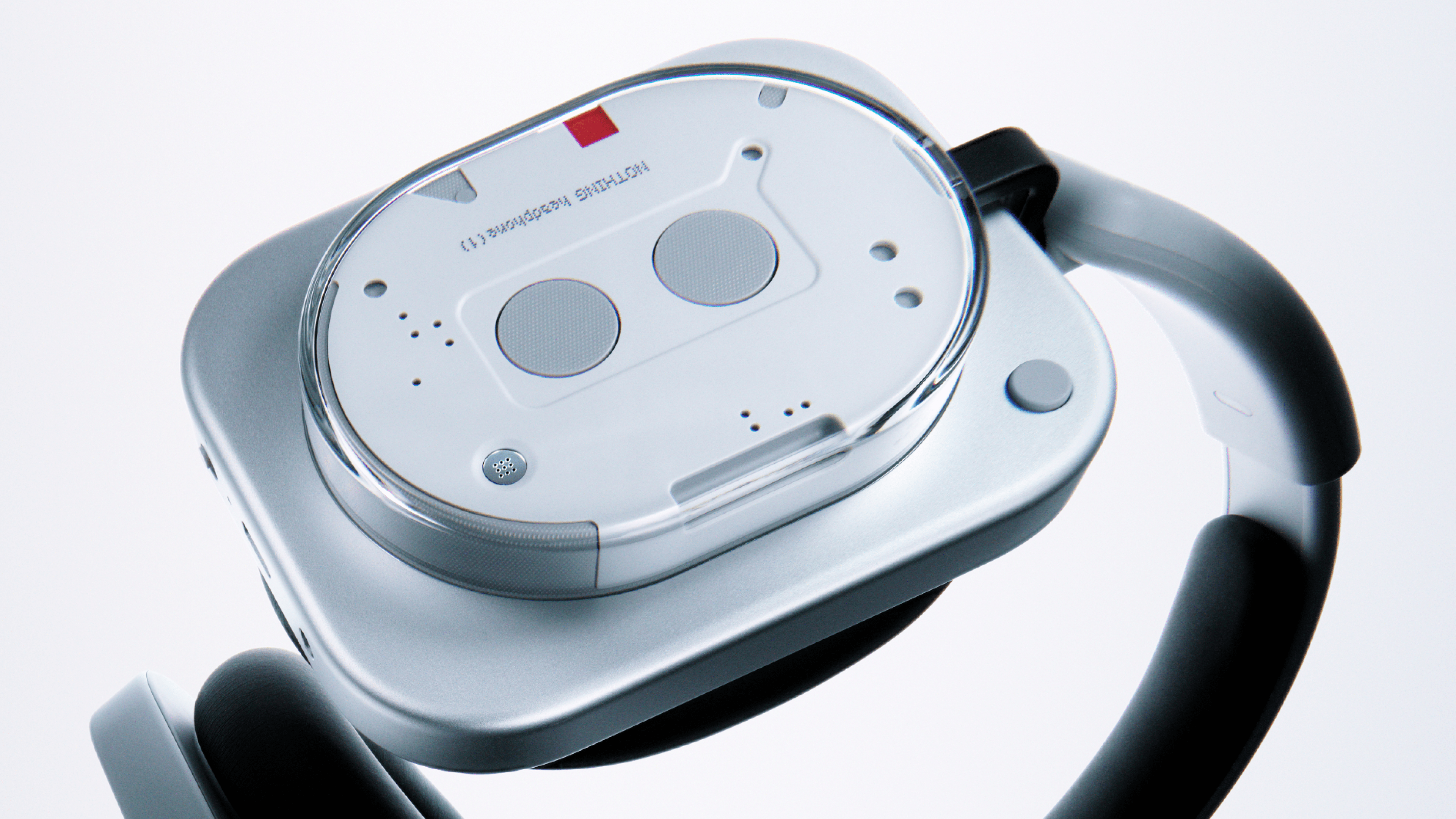 Close-up of Nothing headphones showing the top design and buttons.