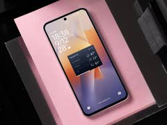 Smartphone displaying weather widget with time and temperature information.