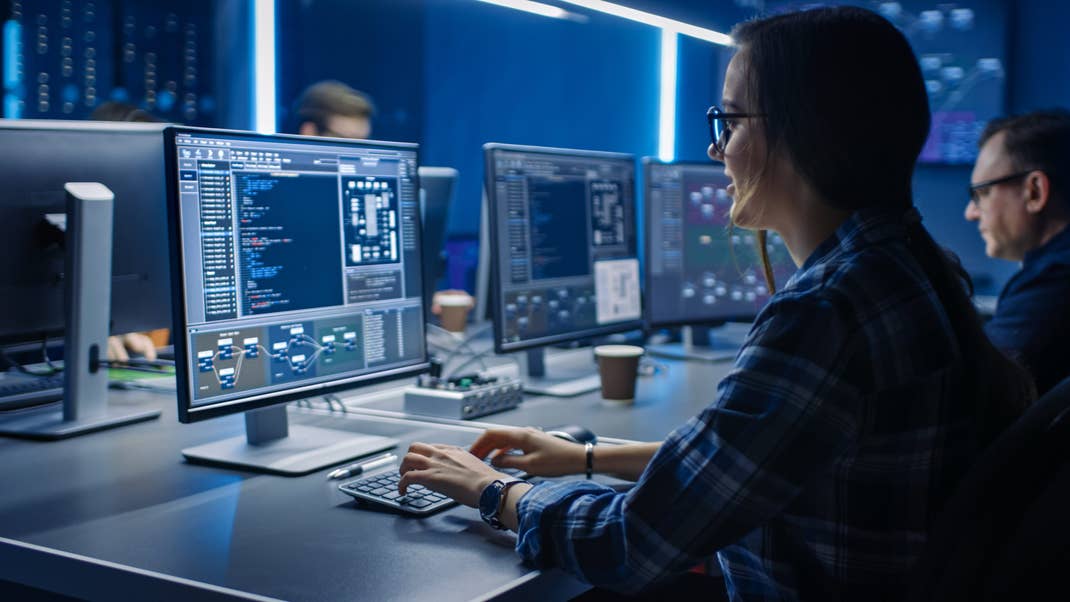Woman sitting in front of a computer