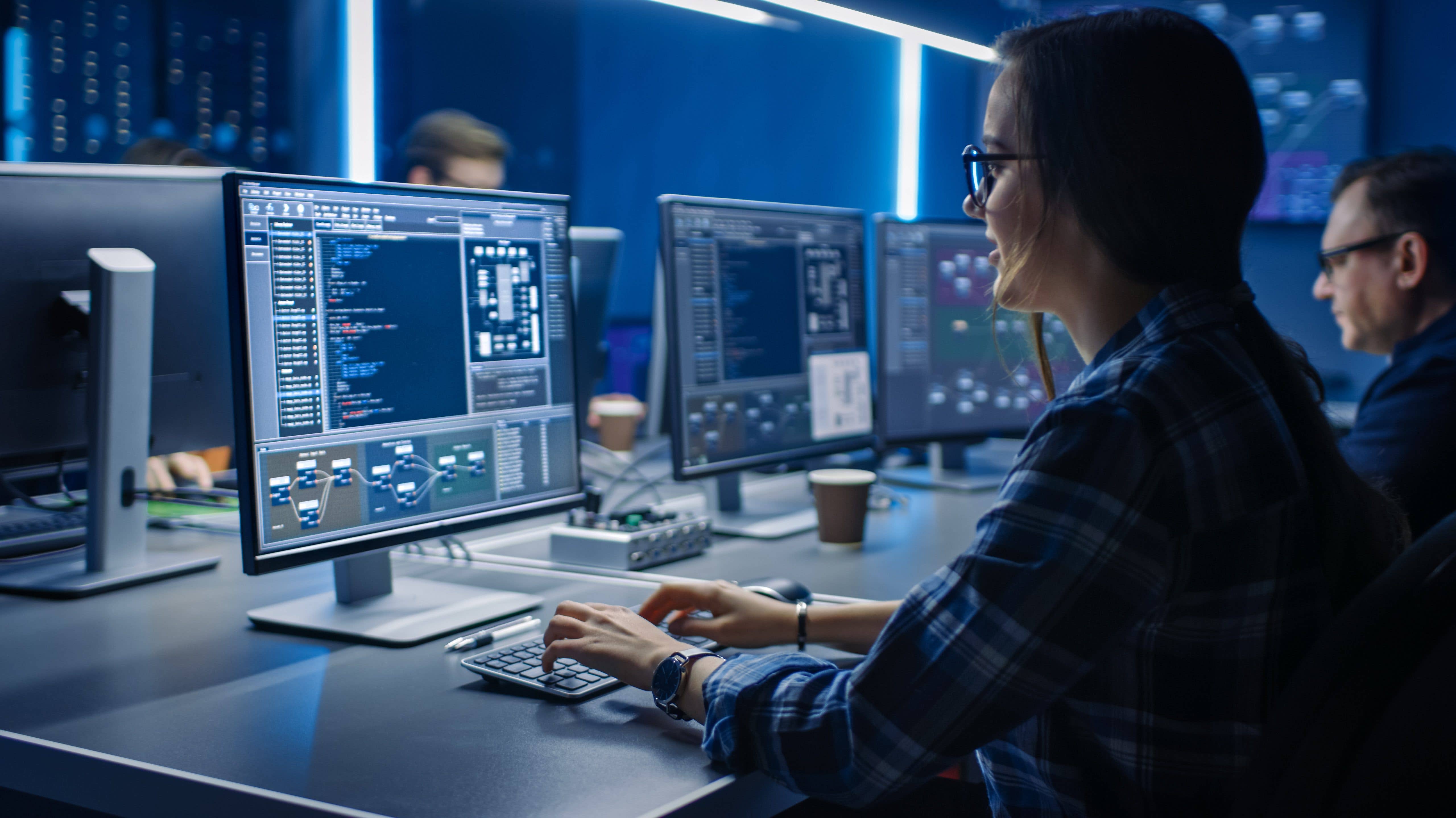 Woman sitting in front of a computer