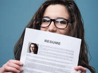 Person holding up a CV