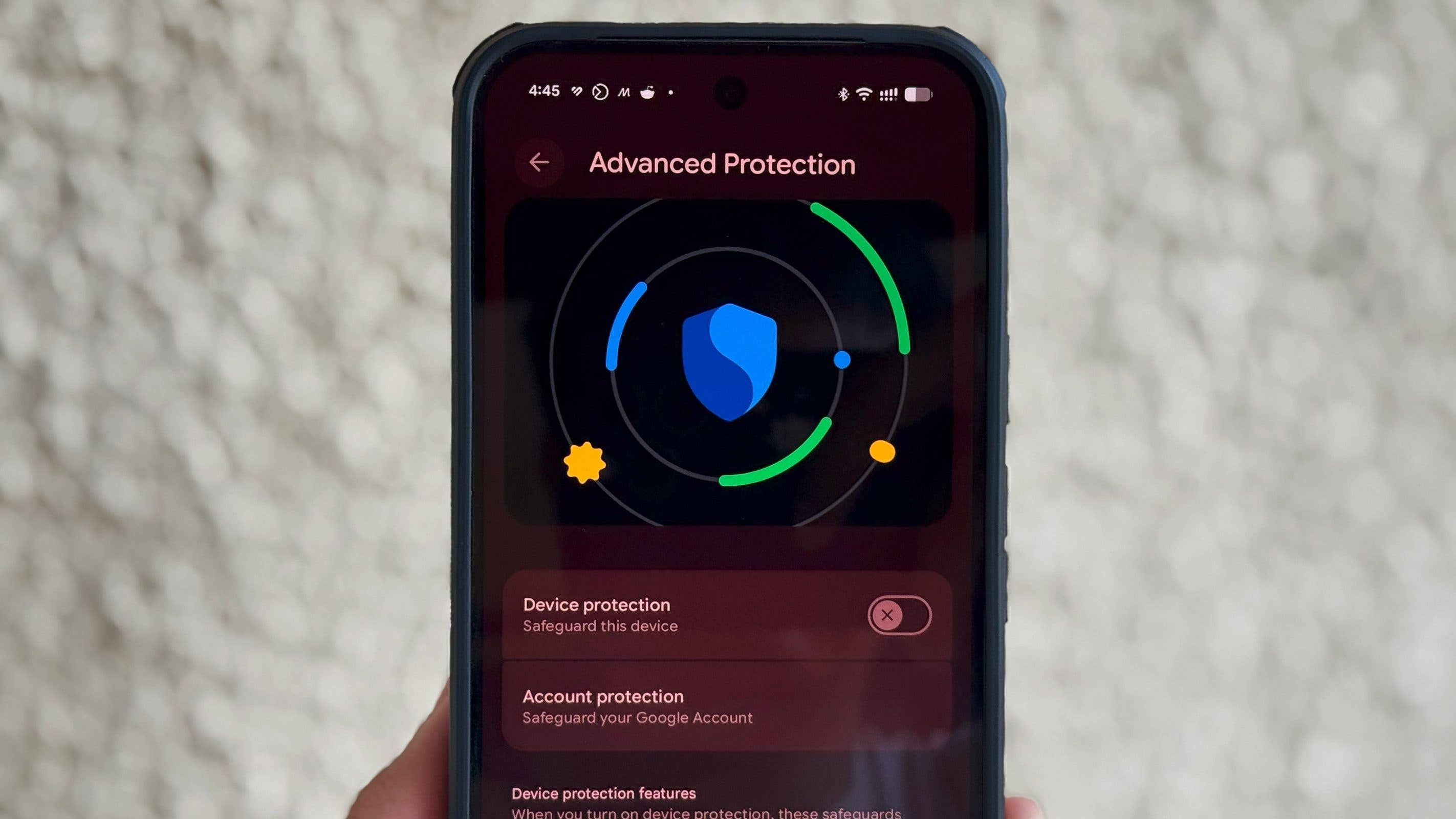 A smartphone displays the 'Advanced Protection' settings with security icons and options for device and account protection.