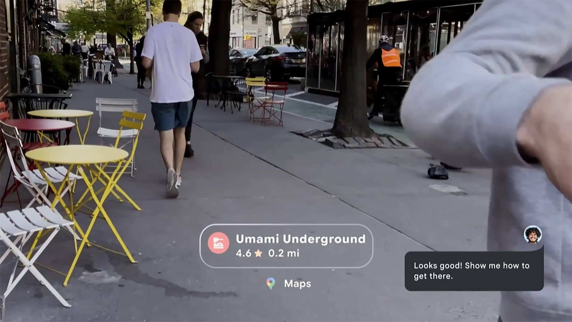 A sidewalk with tables and chairs, showing a person walking and a map card for 'Umami Underground' 4.6 stars, 0.2 mi.