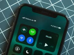 Apple iPhone X with battery percentage indicator