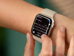 Somebody using the Apple Watch's keyboard