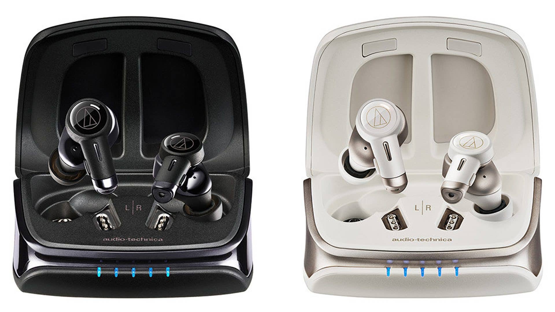 Two pairs of Audio-Technica true wireless earbuds in black and white charging cases.