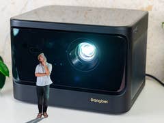 nextpit editor looking at the Dangbei Mars.