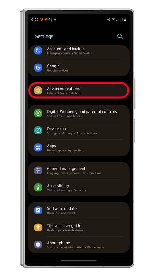 Settings menu on a smartphone displaying options, including u0027Advanced featuresu0027 highlighted.