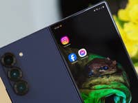 Samsung Galaxy Z Fold 6 smartphone displaying apps on a colorful background.