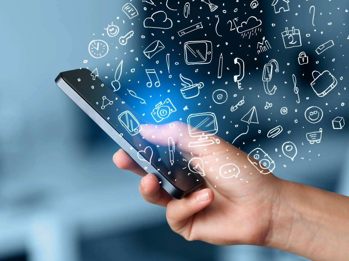 Many app icons floating around a smartphone’s display