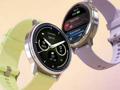Two Garmin Venu 4 smartwatches in different colors, displaying fitness metrics and time.