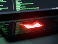 Google's Gmail logo on a smartphone