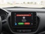 Car dashboard displaying a warning for a scam call detected on Android Auto.