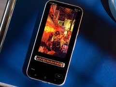 A smartphone displaying a vibrant street scene with lanterns and people, edited in Google Photos.