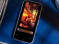 A smartphone displaying a vibrant street scene with lanterns and people, edited in Google Photos.