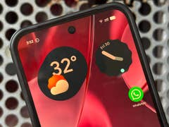 Google's Pixel 9 Pro XL with widgets and WhatsApp app icon.