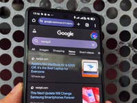 A smartphone displaying the Google search page with 'nextpit' query and news articles below.