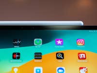 Close-up of an Apple iPad Pro M4 screen displaying various app icons.