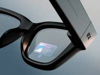 Close-up of Meta Ray-Ban smart glasses displaying an AI interface with travel information.