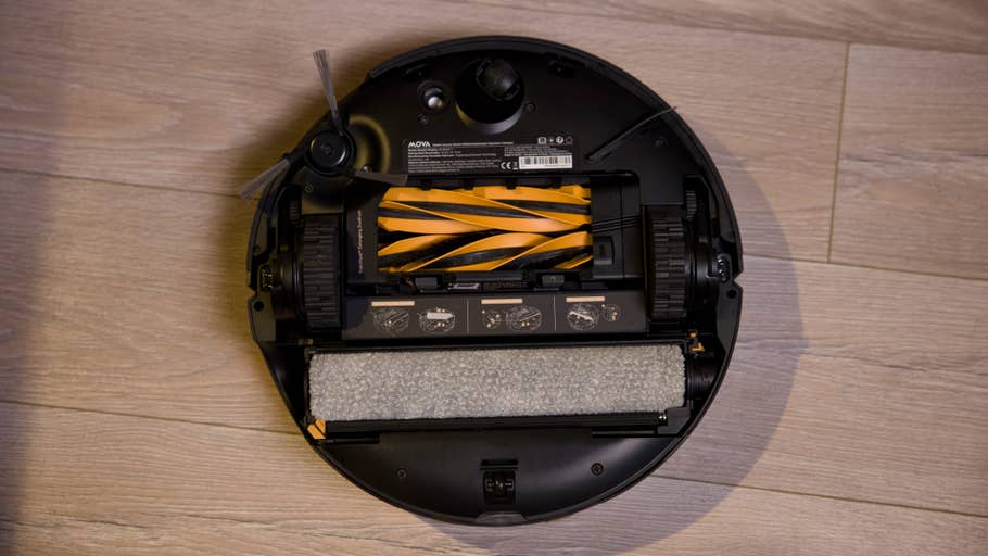 Top view of a Mova Z60 Ultra Roller Complete with visible components and yellow bristles.