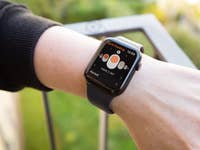 Apple Watch SE in a person's wrist displaying the cycle tracking feature