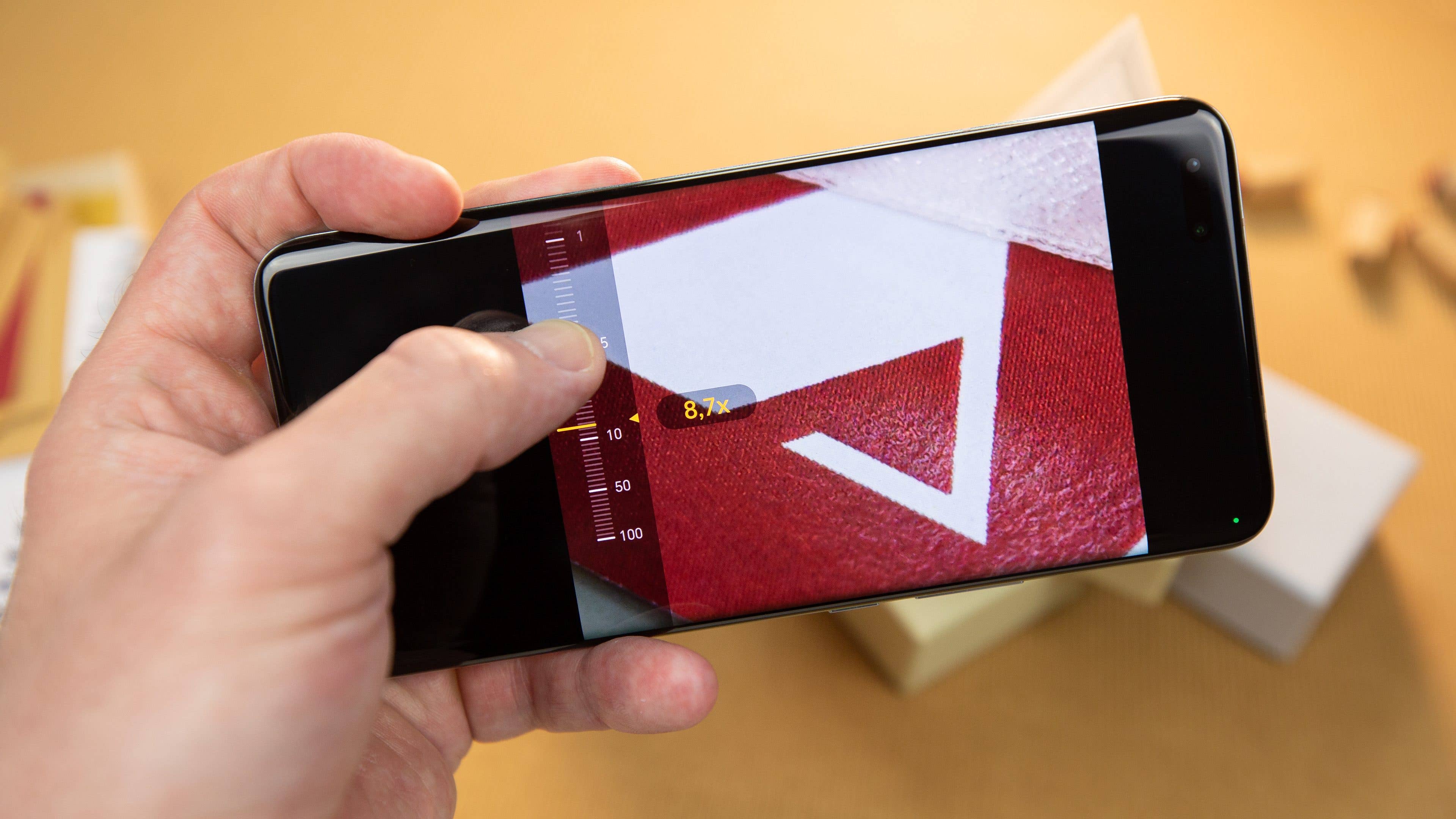 Somebody using the Honor Magic 5 Pro zoom feature in the camera app