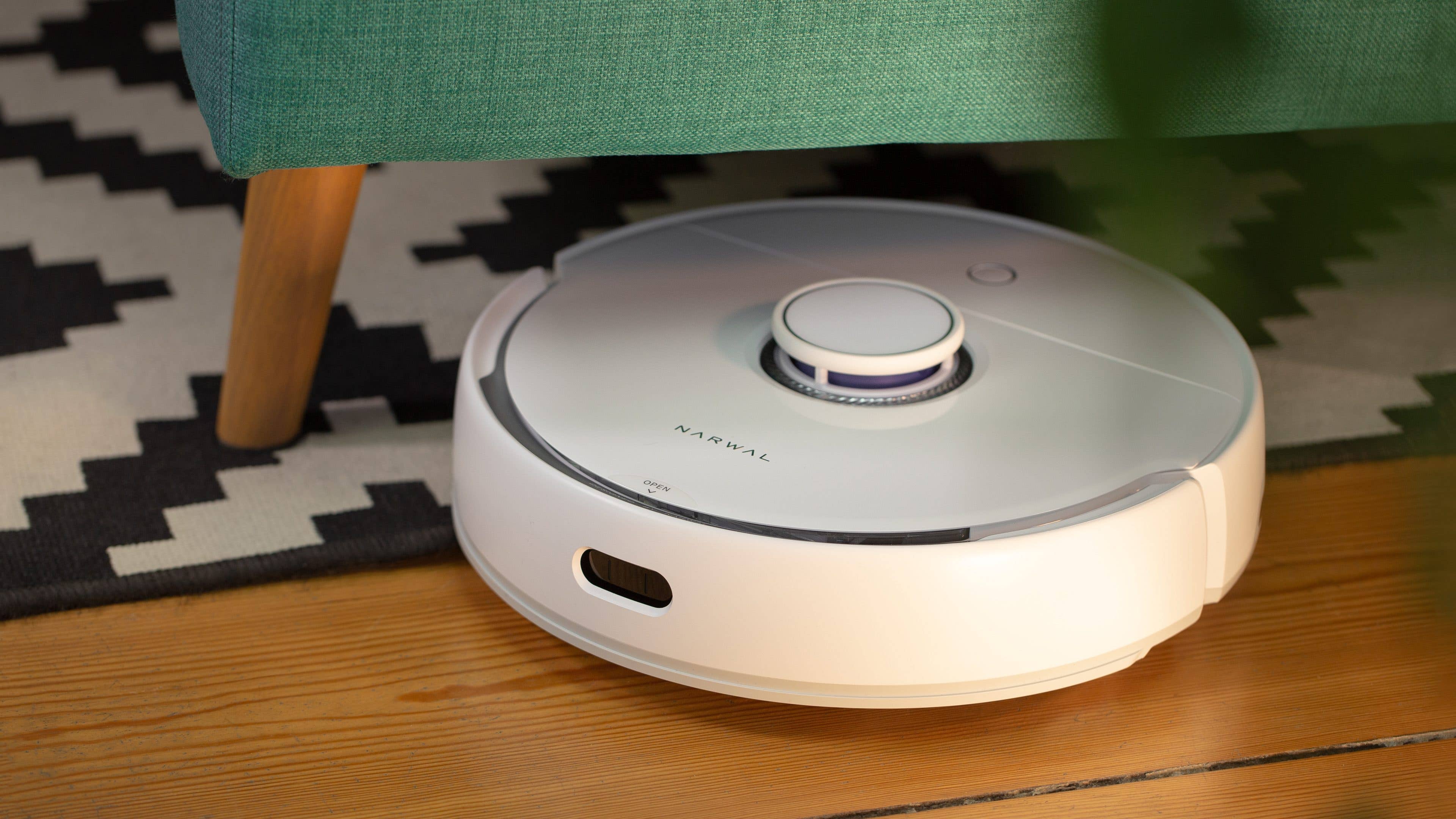 Narwal Freo under a sofa