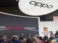 Oppo and OnePlus event during MWC 2023: in the picture, people watching a presentation