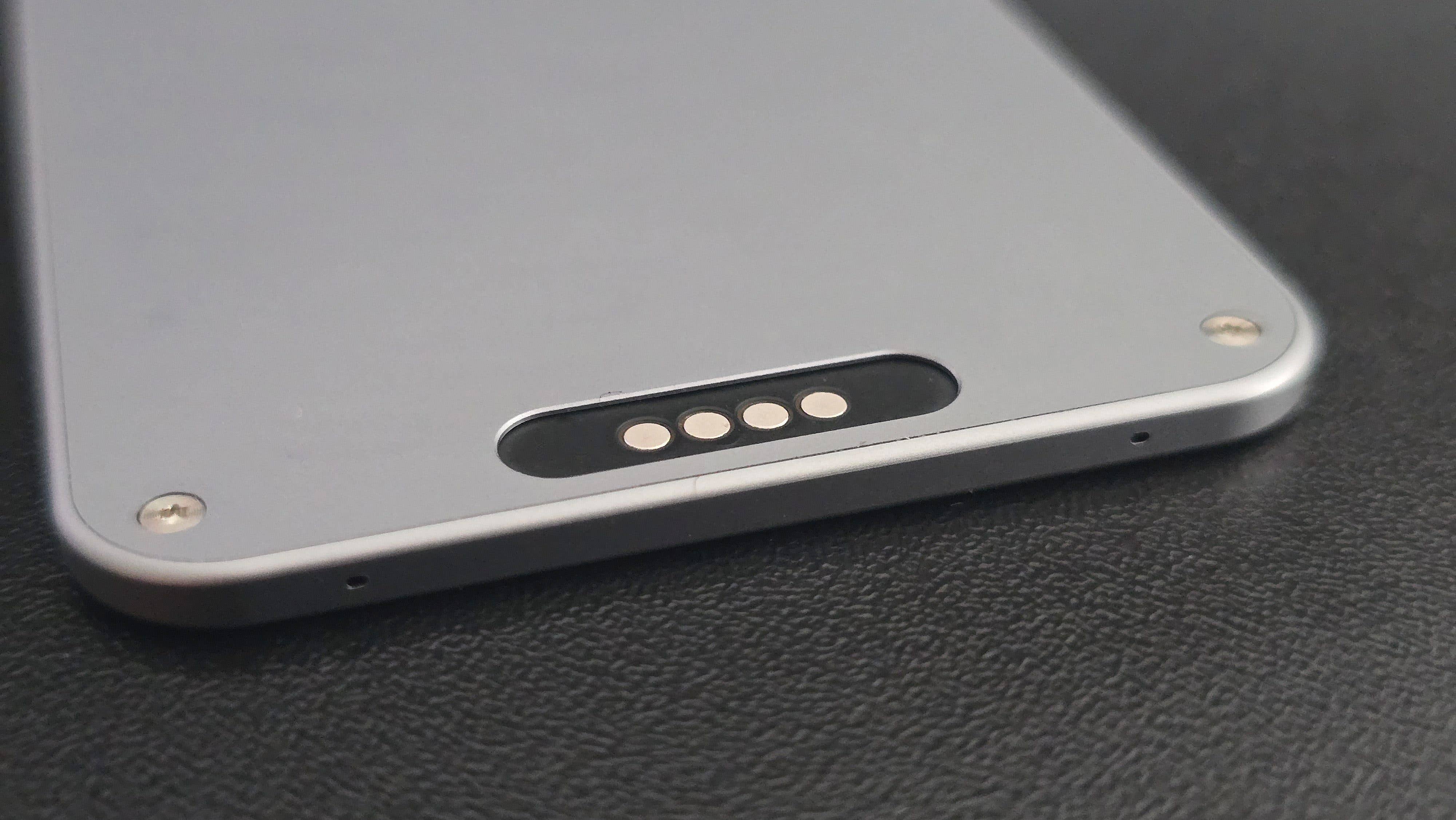 You can charge via the included USB-C cable at this port on the back of the card. You can charge via the included USB-C cable at this port on the back of the card.