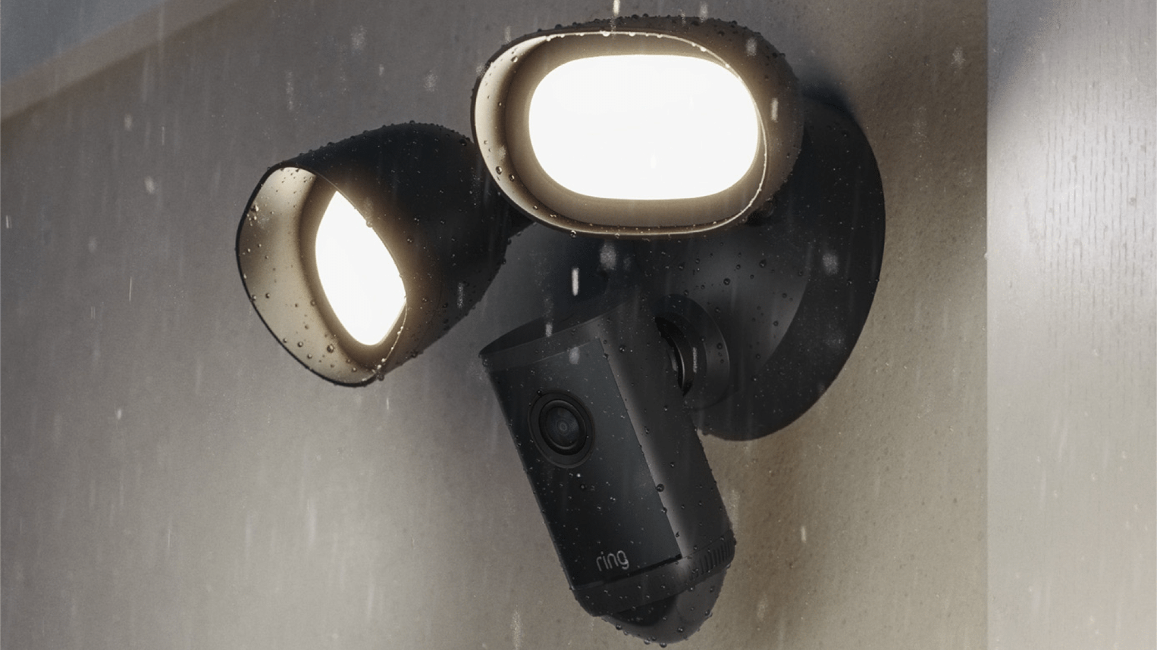 Ring Floodlight with two lights attached to a wall, designed for outdoor security lighting.