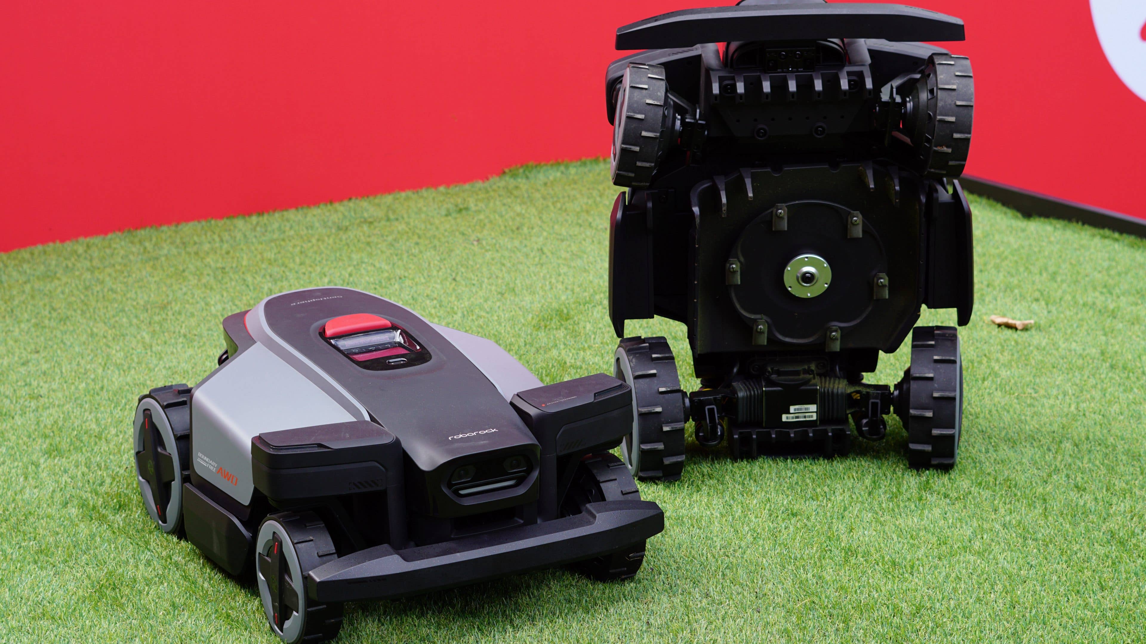 Roborock RockMow Z1 robotic lawn mower on grass, showcasing its sleek design and wheels. Roborock RockMow Z1 robotic lawn mower on grass, showcasing its sleek design and wheels.