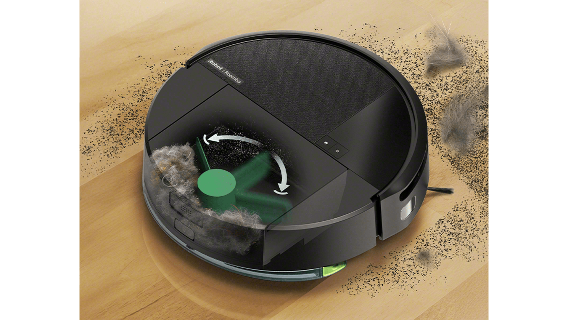 An iRobot Roomba vacuum cleaner on a wooden floor, surrounded by dust and debris.