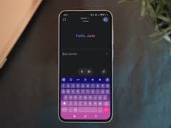 A Samsung Galaxy A35 smartphone displaying a message saying 'Hello, Jade' with a colorful keyboard interface.