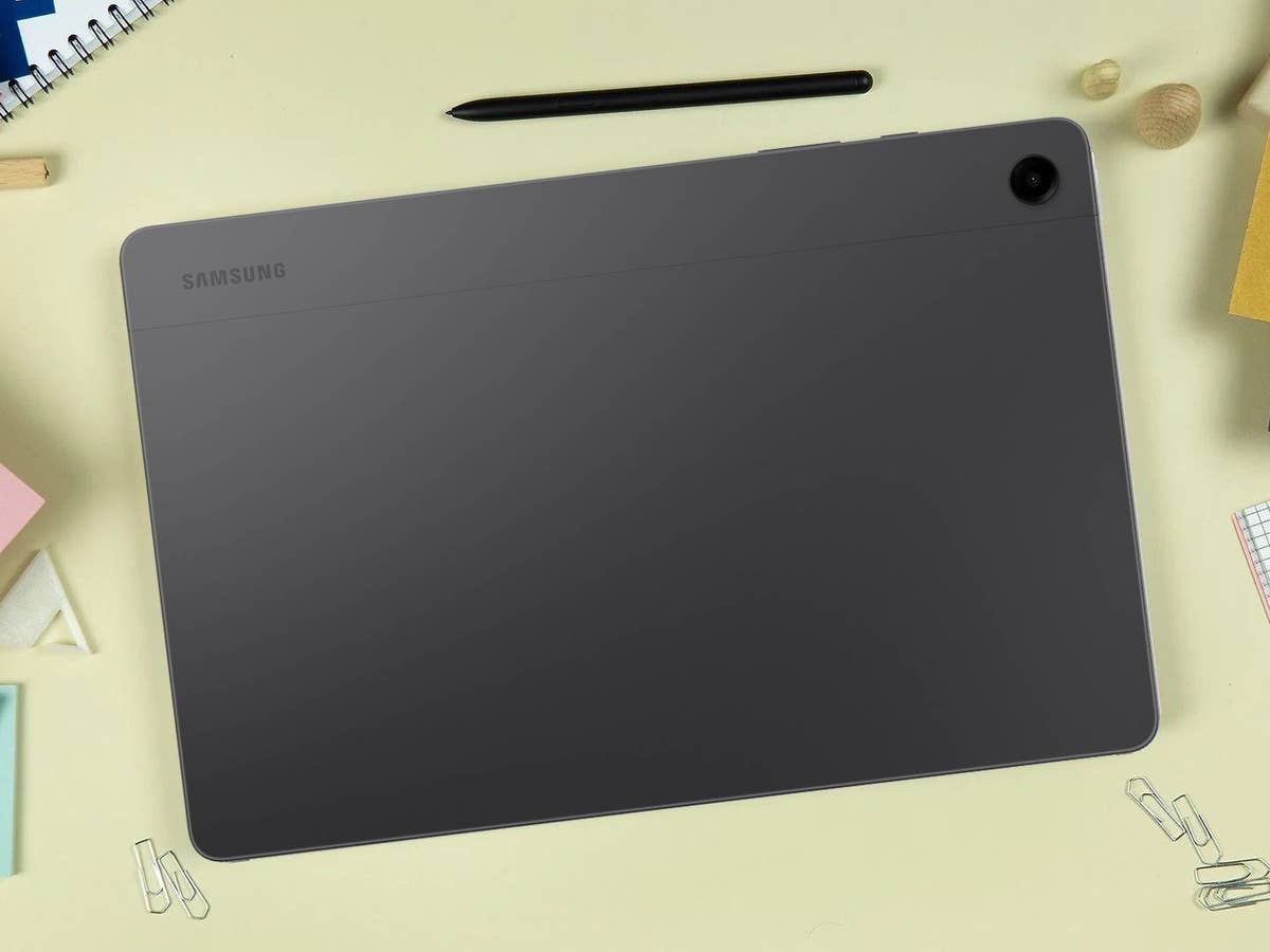 Samsung's Galaxy Tab A9+ is a slim and durable Android tablet. Samsung Galaxy Tab A9+ with a stylus pen on the table.