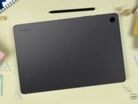 Samsung Galaxy Tab A9+ with a stylus pen on the table.