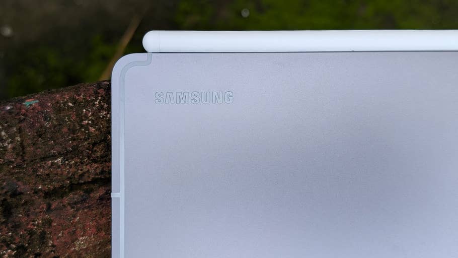 Samsung Galaxy Tab S10 FE with stylus resting on top, showing the Samsung logo.