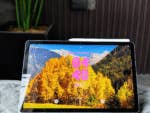 Samsung Galaxy Tab S10 FE displaying a scenic mountain and autumn trees wallpaper with the time 04:40.