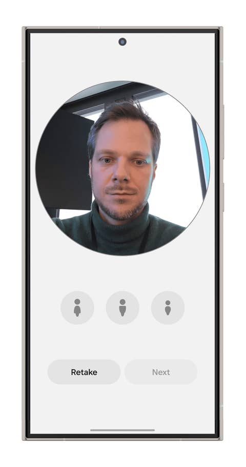 A smartphone screen displaying a selfie with options to retake or proceed.