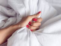 Shutterstock-hand-in-bed-make-love.jpg