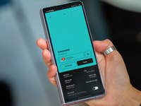 A person holding a Samsung Galaxy Z Fold 5 displaying a VPN connection screen.