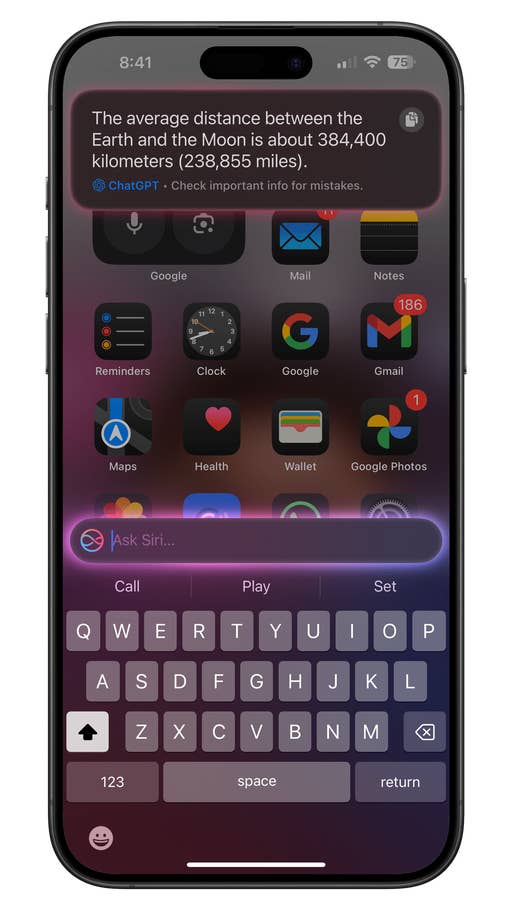 iPhone screen displaying a notification about the distance between the Earth and the Moon, with apps below.