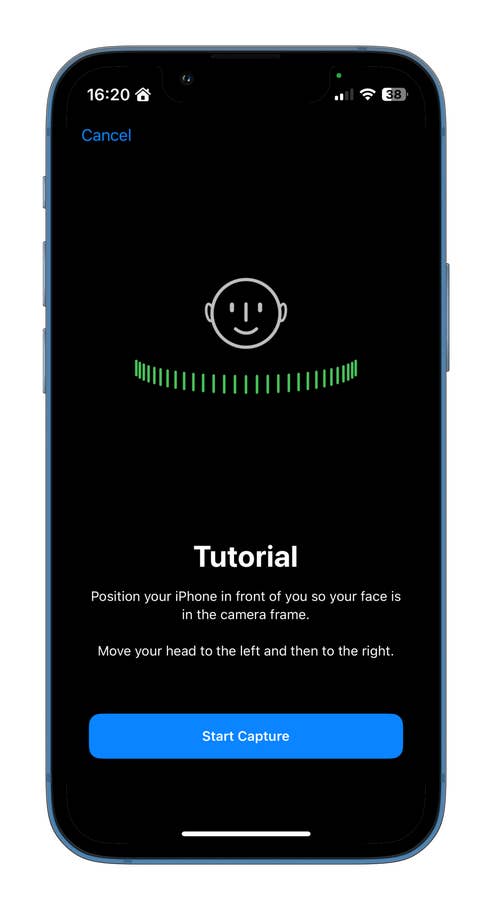 A smartphone displaying a tutorial with instructions for capturing a face using the camera.