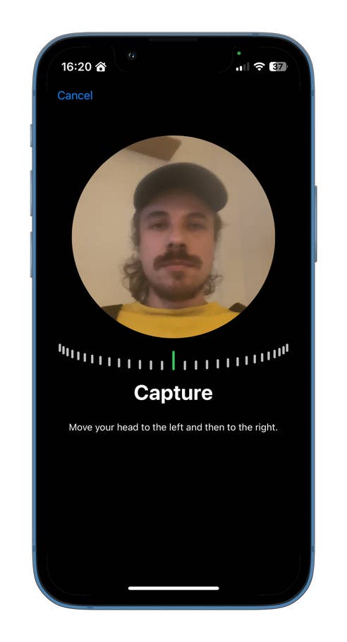 A phone screen displaying a capture process with instructions to move the head left and right.