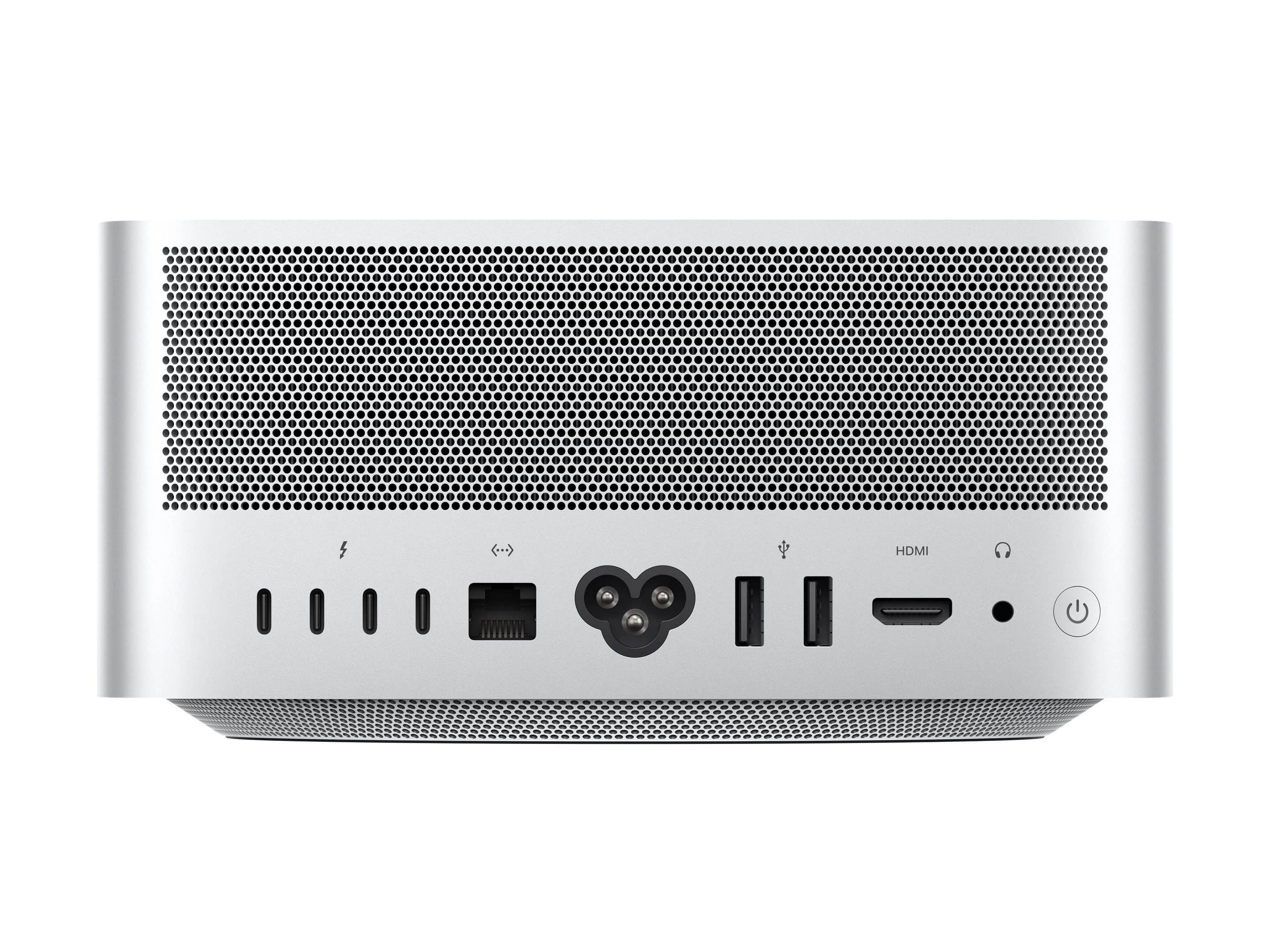 Back view of a silver Apple computer with various ports including USB and HDMI. Back view of a silver Apple computer with various ports including USB and HDMI.