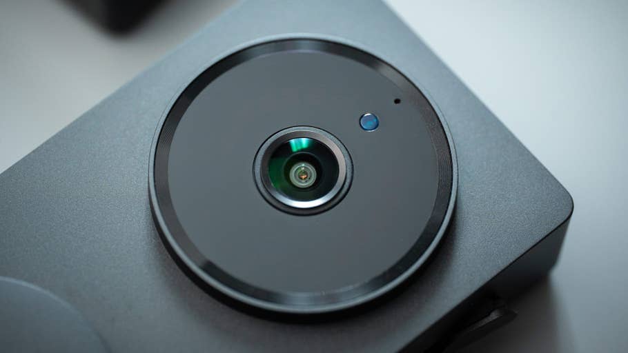 Close-up of the Aqara doorbell camera hub G410 with a round lens and a small indicator light.