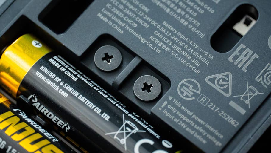 Close-up of batteries and technical specifications for Aqara doorbell camera hub G410.