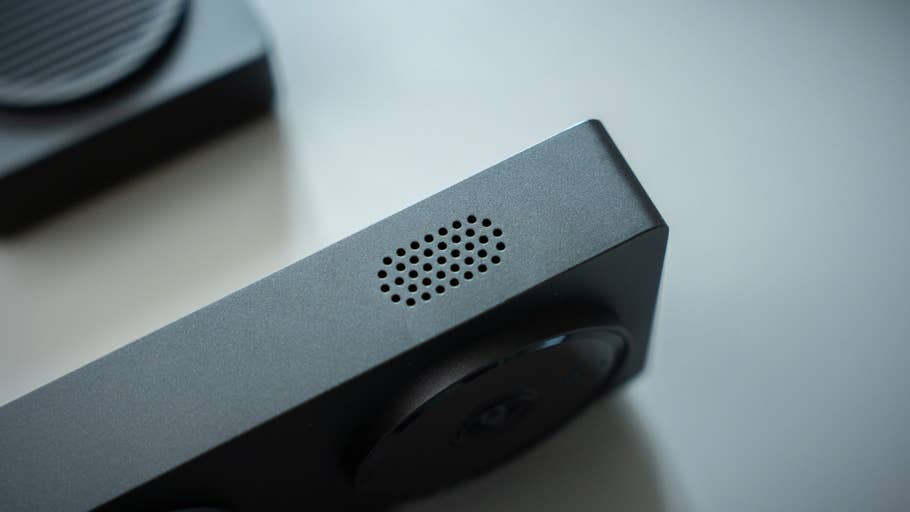 Close-up of the Aqara doorbell camera hub G410, showing its speaker and design details.