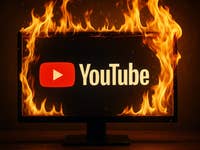 The YouTube logo on a burning monitor.