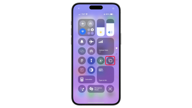 Open the Control Center on your iPhone and then tap on the Cast button. iPhone screen displaying Control Center with various icons and Cellular Data option highlighted.