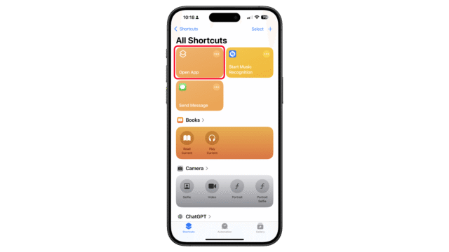 Launch the Shortucts app and tap on Add a shortcut via Open app. iPhone screen displaying the Shortcuts app with various shortcut options.